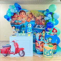 a birthday party with balloons and decorations