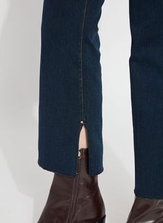 The Eloise Slim Flare w. Piping, made from 4-way stretch Knit Denim, is a slim jean with center back seams for shape through the rear and thigh, a concealed patented waistband and exaggerated flare. It features side seams – detailed in Vegan Suede piping – that are shifted to the front to create the illusion of a slimmer hip. Detailing includes a raw-edge hem, Tobacco topstitching and inseam slits with gunmetal studs. Pull them on with the Cropped Schiffer and Natalia Distressed Vegan Blazer. Kn Fitted Straight Denim Pants, Fitted Dark Wash Bottoms With Straight Hem, Dark Wash Mid-rise Pants With Seam Detailing, Fitted Denim Blue Jeans With Seam Detailing, Fitted Straight Leg Bottoms With Seam Detailing, Fitted Straight Hem Denim Blue Jeans, Fitted Jeans With Seam Detailing For Work, Fitted Bottoms With Seam Detailing And Cropped Leg, Fitted Bottoms With Cropped Leg And Seam Detailing