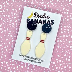 ... Bowling Pin Earrings!  These classic bowling earrings with their  fun retro vibes feature a  black bowling ball stud with a creamy white pin charm with etched and hand painted red stripes. Stainless steel posts and jump rings complete the earrings. Super lightweight and easy to wear  Size Length 5.5cm Width 2cm Shipping and Handling I aim to ship same or next business day. Shipping is standard and generally takes 2-14 business days.  If you require an express service please upgrade shipping Rockabilly Earrings, Rockabilly Accessories, Bowling Accessories, Cowgirl Accessories, Novelty Earrings, Pin Earrings, White Pin, Bowling Pins, Vintage Style Earrings