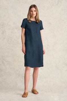 Perfect for transeasonal weather, this 100% French linen shift dress features a relaxed fit through the body with trendy side pockets and a curved hem. Available in Ink with a scoop neck, this flattering and comfortable style can be paired back with a white sneaker for a classic casual look. Blue Linen Dress Relaxed Fit Short Sleeve, Blue Knee-length Linen Dress With Relaxed Fit, Indigo Knee-length Relaxed Fit Denim Dress, Non-stretch Cotton Denim Dress In Medium Wash, Medium Wash Cotton A-line Denim Dress, Linen Shift Dress, Latest Colour, Dress Home, Wide Cuff