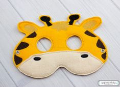 Giraffe Felt Mask (M108)  I Kid's Mask, Dress-Up, Party Favors, Birthday Party, Costume Mask, Felt Mask, Halloween Mask These masks are great for Halloween, party favors, or just to pretend play around the house!!  *Mask Information* Comes with rivets attached, to make it a little more durable. Comes with tied elastic cut to roughly 16-18 inches long, so you can cut the elastic to fit more comfortably on your child. Masks are roughly 5x7, depending on the design ordered. Please note: Most of the Fun Halloween Birthday Party Supplies, Playful Carnival Costume Party Supplies, Playful Party Supplies For Costume Party And Carnival, Playful Party Supplies For Carnival Costume Party, Fun Carnival Costume Party Supplies, Giraffe Mask, Birthday Party Halloween, Party Favors Birthday, Felt Mask