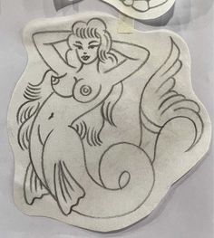 two cookie molds that have been designed to look like mermaids