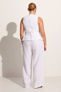 The Stanze Vest in White offers a relaxed and modern take on the classic vest style. Tailored in 100% linen, it features a scoop neckline, four-button front closure, curved front hem and back waist ties for a custom fit. Pair it with the Duomo Pant for an elevated linen set. Vest Crop Top, Vest Style, Maxi Dress Sale, Faithfull The Brand, Linen Set, Vest White, Vest Fashion, Top Collection, Linen Women