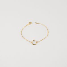 Simple and Dainty, our Karma ring bracelet has a special meaning behind it. The karma ring is meant to attract good karma to you and those around you. - Karma ring measures 10mm - Ring has a hammered finish - Available in Sterling Silver or 14k Gold Filled L E N G T H - This bracelet is measured opened from end to end - Not sure what length to get? Step 1: Use a string to mark the spot you would like your bracelet Step 2: Measure the string's length with a ruler - Want an adjustable length? Visi Minimalist White Jubilee Chain Bracelet, White Chain Bracelet With Adjustable Chain, White Round Chain Bracelet With Adjustable Chain, Minimalist White Chain Bracelet, Minimalist Round Bracelets For Friendship, Everyday Round Bracelets With Spring Ring Clasp, Everyday Round Bracelet With Spring Ring Clasp, Minimalist Round Chain Bracelet With Strap, Dainty Bangle Jewelry For Friendship