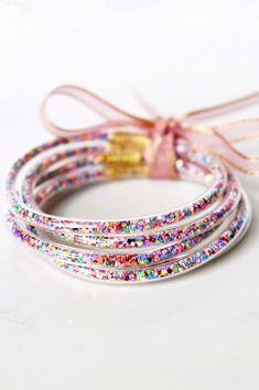 Confetti Glitter Jelly Tube Bracelt Waterproof Set of 5. One Size fits most. Jelly Bracelets, Talk To The Hand, Tube Bracelet, Colorful Confetti, Bracelet Stacks, Horse Earrings, Bangle Bracelet Set, Stacked Bangles, Bangle Set