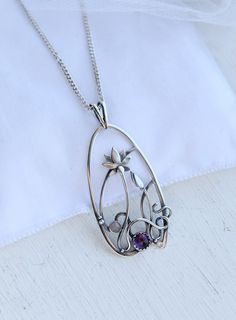 The size H 4 cm x W 3 cm (1 3/4 x 1 inch). Weight - 6g. You can buy it with the chain or without. The most delicate flower of the lotus can make someone very happy. I made this botanical jewelry of sterling silver, amethyst, and peach moonstone. This is a true work of art. It will emphasize your exquisite taste and status, and will also bring a lot of compliments. Lotus flower earrings https://www.etsy.com/listing/676137548/lotus-flower-earrings-sterling-silver?ref=shop_home_active_2&frs=1 O Handmade Art Nouveau Jewelry Gift, Amethyst Flower Pendant Jewelry Gift, Amethyst Flower Pendant Jewelry For Gift, Handmade Art Nouveau Necklace For Gift, Hand Forged Purple Necklace For Gift, Handmade Art Nouveau Necklace Gift, Amethyst Large Pendant Jewelry Gift, Silver Gemstone Jewelry In Art Nouveau Style, Art Nouveau Silver Gemstone Jewelry