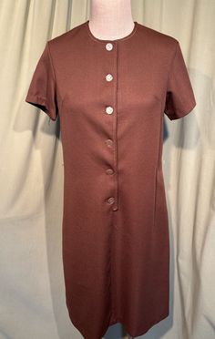 Retro Fitted Brown Mini Dress, Vintage Brown Lined Dress, Fitted Brown Mini Dress With Button Closure, Retro Brown Dress For Fall, Retro Brown Lined Dress, Vintage Mini Dress With Buttons For Fall, Vintage Brown Short Sleeve Dress, Retro Brown Dress With Buttons, Brown Vintage Short Sleeve Dress