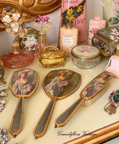 A very pretty vintage Fifth Avenue 1940s dressing table vanity set consisting of the matching hand mirror, and a pair of hair brushes in the original box.  The set has a gorgeous image on the backs of each piece depicting an image of Gainsborough's famous painting, "The Hon. Mary Cathcart, The Hon. Mrs Thomas Graham" which is in the collection of the National Gallery of Scotland, and each piece is trimmed with gold tone metal. The set comes in the original presentation box, which is lined with q Dresser Vanity, Dressing Table Vanity, Vintage Dressing Tables, Antique Vanity, Styling Brush, Vintage Makeup, National Gallery, Hand Mirror, Sweet Nothings