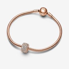 Shine bright from all angles with the Sparkling Pavé Triple-row Charm from the Pandora Moments collection. This cubic zirconia charm is made from a 14k rose gold-plated metal and is designed to shine on its own, or next to one of your existing 14k rose gold-plated charms. Crafted from exactly 85 pavé-set round brilliant-cut clear cubic zirconia, this sparkling pavé charm lends an elevated sparkle to the everyday. - Pandora Sparkling Pavé Triple-row Charm - 14k Rose gold-plated unique metal blend / Cubic Zirconia / Clear Mesh Bracelet, Pandora Charm, Shine On, Dangle Charms, Lab Created Diamonds, Shine Bright, Snake Chain, Free Jewelry, Round Brilliant