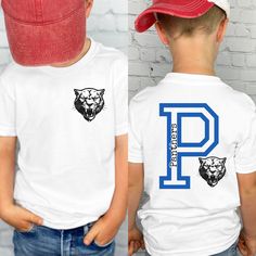 If you're looking for the perfect custom boys school spirit t-shirt, school shirt, mascot shirt, boys pink out shirt, school colors shirt, or personalized boys gift for school then look no further!  PRODUCT DETAILS For printing, we use Bella Canvas, Gildan SoftStyle, and Comfort Colors brand shirts, which are the best in the industry. Brand of shirt will be noted in the description. If you would prefer a different brand then the one being used, please message us and we'll be happy to accommodate School Spirit Shirts Boys, Customizable Crew Neck School T-shirt, Customizable Crew Neck T-shirt For School, School Spirit Shirt For School Events, Customizable School Spirit Tops For School, Customizable School Spirit Tops, Team-colored Custom Print T-shirt For School Spirit, Team-colored Graphic Print T-shirt For School, School Spirit Shirt With Crew Neck For School Events