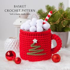 This magical mug of hot chocolate crocheted from T-shirt yarn with marshmallows is a basket! It will be very original to give a Christmas gift in such a gift box, I am sure the recipient will be delighted! The mug basket is roomy - it will fit sweets, a small toy, or, for example, a hat or mittens. You can knit such a basket in a couple of hours, the pattern is simple and clear and is suitable for beginners. And the idea with ready-made pompoms as marshmallows will save time. LANGUAGE ● English Basket Crochet Pattern, Crochet Pattern Christmas, Yarn Basket, Basket Crochet, Crochet Lessons, Hot Chocolate Mug