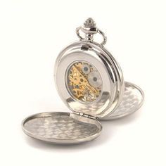 The jeweled mechanical movement in this pocket watch is reminiscent of the golden days !  Both the front and back covers open to reveal the skeleton dial - you can actually see all the little cogs and wheels that make it run.  The dial is white with black hands and roman numerals.This pocket watch measures 1 7/8" in diameter and includes a 14" removable watch chain.These look great engraved with initials, name and date, or a monogram.  I could even engrave a short saying or verse!  Both front an Groomsmen Watches, Watch Chain, White Face, Mechanical Movement, Black Hand, Dust Cover, Roman Numerals, Watch Case, Hand Engraving