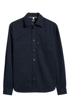 Casual and versatile, this shirt made of soft cotton features a dark-navy wash and a fit that looks great whether you wear it tucked or untucked. 29" length; 42" chest (size Medium) Front button closure Spread collar Long sleeves with button cuffs Chest patch pockets 100% cotton Machine wash, dry flat Imported Indigo Button-up Cotton Shirt, Indigo Button-up Shirt With Pockets, Indigo Button-up Top With Button Closure, Affordable Light Indigo Button-up Shirt, Light Indigo Cotton Button-up Shirt, Dark Navy, Button Up Shirts, Button Up, Dark Blue