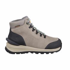 On the job or on the trail, these women's hiking boots offer comfort and protection for long days spent outside. They come equipped with a durable leather upper and a waterproof, breathable membrane to keep feet dry in wet, muddy conditions. A slip-resistant outsole meets ASTM F3445-21 SR standards to help protect against slips, trips, and falls.FeaturesGrey nubuck leatherCement construction with Carhartt outdoor-ready rubber lug outsoleStorm Defender® waterproof breathable membraneRevolutionary Mining Boots, Ariat Western Boots, Logger Boots, Slip Resistant Shoes, Work Shoes Women, Insulated Boots, Steel Toe Boots, Carhartt Womens, Hiking Boots Women