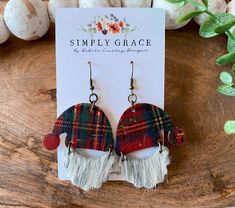 Incredibly soft and flowy genuine cork leather Christmas plaid Santa boho earrings.  These earrings are so light weight - you will barely remember you are wearing them!  We use genuine leather/cork in all of our earrings. Our earrings are made to order just for you and we have several shapes/sizes/patterns and dozens of colors so the possibilities are endless!  Looking for a custom pair to match a specific outfit? Message us and we can create something special just for you!  Standard hardware is Christmas Leather Earrings, Cricut Christmas Leather Earrings, Leather Christmas Earrings, Santa Tassel Earrings, Red Leather Earrings For Gifts, Christmas Tree Faux Leather Earrings, Plaid Leather Earrings, Leather Christmas, Plaid And Leather