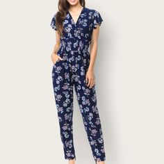 The Epitome Of Fashion Meets Comfort. A Relaxed Fit Jumpsuit Made With Stretchable Fabric, Featuring A Wrapped V-Neck Design Top, Long Loose Pant Legs, And Short Ruffled Cap Sleeves. Condition: New With Tags Product Details - Color Block Floral - High Elastic Waistline - Fit True To Size - Side Pockets - Pull On - Rn 141401 - Imported Size & Fit (Approx. Flat Lay Measurements) - Size S/M - Chest 20" - Length 54“ Materials & Care - 90% Polyester, 10% Spandex - Hand Wash Cold Offers Welcomed! Addi