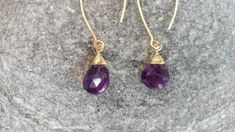 "The perfect everyday earring! This beautiful earring is handmade with either sterling silver or gold filled wire and a natural faceted teardrop amethyst. Completely hypoallergenic and tarnish resistant. Perfect to dress up, but can also be dressed down with jeans and a tee shirt. The stones measure approximately 1/2\" and hang from a 2\" open ear wire. *I can make the ear wire longer or shorter if you need. Please message me for custom length. *Custom colors are also available upon request. Ple Dainty Purple Earrings With Ear Wire, Purple Dainty Earrings With Ear Wire, Everyday Purple Amethyst Earrings, Purple Gemstone Earrings For Everyday Wear, Everyday Purple Gemstone Earrings, Everyday Purple Jewelry With Ear Wire, Elegant Purple Earrings For Everyday, Dainty Wire Wrapped Earrings For Everyday, Dainty Wire Wrapped Everyday Earrings