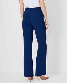 Elevate your wardrobe with the Petite Side Zip Trouser Pant in Fluid Crepe by Ann Taylor, a testament to timeless elegance and comfort. These pants are meticulously designed to enhance your silhouette, featuring a high-rise fit that sits just below the natural waist and a flattering trouser leg with a gentle flare to elongate your legs.

- **Size:** Petite 12
- **Color:** Pure Sapphire
- **Material:** 95% Polyester, 5% Spandex
- **Fit:** Tailored and fitted
- **Length:** Full length; 29" inseam Elegant Stretch Bottoms With Zipper Closure, Elegant Pants With Zipper Closure For Fall, Elegant High Waist Pants With Zipper Closure, Elegant Straight Leg Bottoms With Zipper Closure, Elegant Office Bottoms With Zipper Closure, Wide Leg Stretch Pants With Zip Fly, Elegant Bottoms With Zipper Closure For Spring, Wide Leg Workwear Bottoms With Zip Fly, Wide Leg Bottoms For Workwear With Zip Fly