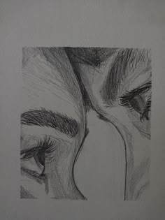 a pencil drawing of two people's eyes