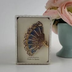 "A very rare, articulated, metal damascene fan brooch, signed Spain. Blue enamel and gold plated. Gift for her. Collectible Vintage jewelry. Elegant woman. The segments have beautiful gold tone, embossed buildings designs, on a bright blue enamel background, with white enamel accents. Each segment is 9/16\" wide and there are 7 segments. It is 2&3/4\" wide (fully open), 2\" high, and 1/2\" thick. Believe this is from the 80s, purchased from an estate. Excellent pre-owned condition, I do not beli Jewelry Elegant, Hand Painted Plates, Gold Brooches, Pearl Brooch, Vintage Brooch, The 80s, White Enamel, Vintage Brooches, Bright Blue