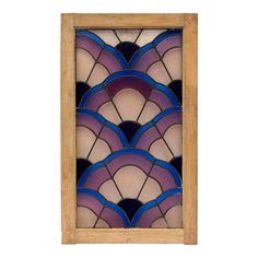 an art deco stained glass window with blue and purple designs on the outside, framed in wood