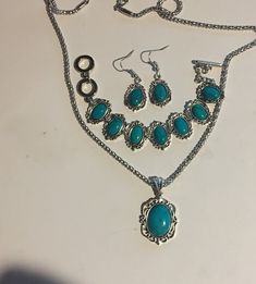 Turquoise or Red  Turquoise  Silver Oval Pendant Shaped Pendant Necklace , Bracelet and Earrings Set ! Silver necklace is 20" and has an extender ! Bracelet has a Lobster Claw Clasp  Closure and is adjustable 7 Pendant is almost 1 3/4" high including the Bale and 1 " Wide Earrings are 1 1/2" with the Hook. The Bracelet has a Toggle Closure and 8" and adjustable to make smaller Your Choice Of Blue , Blue green turquoise or Red BLUE GREEN TURQUOISE PENDANT IS 1 1/2" INCLUDING THE BALE, 20" NECKLACE + 2" EXTENSION / EARRINGS HANG1 1/2" LONG / BRACELET GOES FROM 6 1/4" - 7 " This will come in a gift box ! Please feel free to ask any questions as I do not accept returns but contact me if there is a problem ! Thank You for stopping by