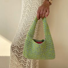 Crochet green small shoulder bag Trending now crochet bag a piece that will accompany you from special occasions to your daily life. The cute green bag provides both a youthful and dynamic look. Always carry the energy of spring and summer with you! The crochet tote bag has enough space for your daily items such as phone, headphones, wallet and makeup. It will always make a difference with its elegance and originality while accompanying you in your daily use or as a weekend bag. If you are looki Trendy Light Green Bag For Everyday Use, Cute Green Pouch Shoulder Bag, Trendy Rectangular Crochet Bag For Gift, Trendy Rectangular Crochet Bag As Gift, Trendy Knitted Tote Shoulder Bag, Trendy Handmade Crochet Bag For Gifts, Trendy Crochet Pouch Bag As Gift, Trendy Handmade Crochet Bag As Gift, Green Trendy Crochet Shoulder Bag