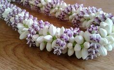 the flowers are laying on the table and ready to be put in the vases