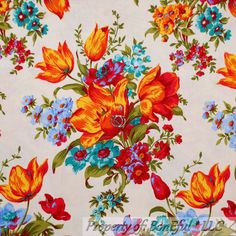 an orange and blue floral print on white fabric