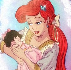 the little mermaid is holding her baby girl