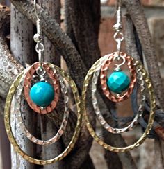 Tri Color Hammered Hoops Dangle a turquoise bead by ShalomJewelry Bead Hoop Earrings, Leather Jewelry Diy, Boho Hoop Earrings, Boho Earring, Copper Jewellery, Earring Hoop, Hammered Hoop Earrings, Mixed Metal Jewelry, Color Turquoise