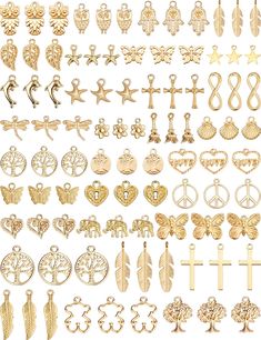 many different types of earrings and pendants on a white background, all in gold