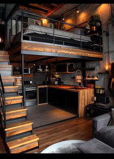 a loft with stairs leading up to the kitchen