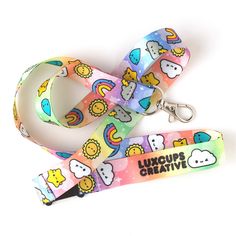 "This cute lanyard has a sturdy thumb clasp to hold keys, badges and more! Features a safety breakaway clasp making these great for school, work and conferences. Details: - 0.75\" wide - 18\" long (36\" end to end when open) - Silver tone thumb clasp - Vivid dye sublimation - Double sided print - Made of silky polyester - Breakaway safety clip at neck - Ships in a protective bubble mailer - Illustrated by Libby Johnston Napier Don't forget to add some of our enamel pins to your cart to complete Kidcore Accessories, School Lanyard, Saving Account, Cute Lanyard, Rainbow Badge, Cute Lanyards, School Badges, Badge Lanyard, Dinosaur Gifts