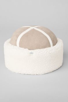 Achieve it-girl status in the Zhivago hat. It has a plush sherpa brim and a heat-retaining sherpa lining, plus a soft, suede-like crown with faux leather detailing. It’s the chicest way to battle winter chill—especially when you style it with a sherpa jacket. Beige Winter Hat With Flat Brim, Adjustable Cream Winter Hat, Cream Adjustable Winter Hat, Cream Winter Hat With Adjustable Fit, Cream Brimmed Winter Hat, Cream Adjustable Beanie Hat, Adjustable Cream Beanie Hat, Warm Cream Cap, Cream Brimmed Bonnet