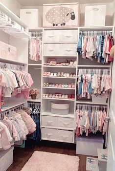 an organized closet with lots of baby clothes