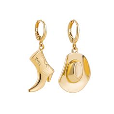 two gold earrings with the letter o on them