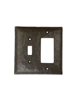 a metal outlet cover with two holes