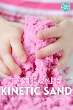 a child is playing with pink sand in their hands and the text reads, taste safe kinetic sand