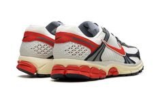 The Nike Zoom Vomero 5 "USA" is a patriotic colorway of the retro running and lifestyle shoe.  The Nike Zoom Vomero 5 debuted in 2010 and was later part of the popular Y2K sneaker trend in the 2020s.  Here, on the “USA” colorway, the shoe sports the colors of the American Flag: red, white, and blue.  Specifically, the upper features a Summit White mesh base and Navy leather overlays.  A Picante Red Swoosh can be found on both sides, while more red accenting appears on the heel overlay and on the heel of the rubber outsole.  Classic “Nike Zoom Vomero 5” detailing is located on the tongue tag.  A cream midsole gives the shoe an aged look.  Release date: June 29, 2024 Nike Custom Sneakers With Vibram Sole For Running, Dynamic Nike Running Shoes With Rubber Waffle Outsoles, Nike Retro Custom Sneakers For Sports, Retro Nike Custom Sneakers, Dynamic Nike Custom Running Sneakers, Dynamic Nike Custom Sneakers For Running, Retro Air Max Sneakers For Running, Retro Nike Running Shoes, Nike Retro Running Sneakers