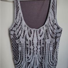 Silvery Lace. Never Worn. Elegant Silver Tank Top For Spring, Elegant Silver Tank Top For Summer, Fishnet Long Sleeve Top, Shimmer Blouse, Silky Top, Black Sheer Blouse, Printed Sleeveless Blouse, Silver Lace, Grey Blouse