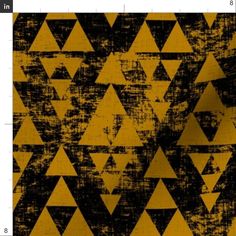 black and yellow triangles are arranged in an abstract pattern on a dark background, which is slightly sepiaped