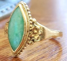 Gold Vintage Turquoise Ring For Formal Events, Vintage Gold Turquoise Ring For Formal Events, Gold Vintage Turquoise Ring For Formal Occasions, Vintage Gold Turquoise Ring For Formal Occasions, Traditional Green Hallmarked Rings, Traditional Green Oval Emerald Ring, Gold Formal Emerald Ring With Chrysoprase, Gold Chrysoprase Rings For Anniversary, Formal Gold Emerald Chrysoprase Ring