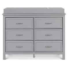 a gray dresser with six drawers and two doors on the top, in front of a white background