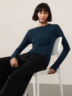 FOR: Commute, travel, hiking in cold weather climates FEEL: New and improved Merino Wool yarn is ultra-soft and lightweight FAVE: Pointelle stitching down the front for breathability Close-to-body fit make it the perfect base layer Light mesh structure on back facilitates ventilation Fitted next to the body Regular length, hits at low hip Crew neck Body length in size medium: Regular: 23". Seamless Top, Bra Dress, Weather And Climate, Travel Hiking, Merino Wool Yarn, New And Improved, Free Fabric, Body Fit, Base Layer