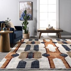 a living room filled with furniture and a rug