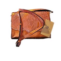 Patricia Nash "Sarola" Crossbody Bag Nwt Copper Metallic Distressed Hand Tooled Leather Card And Dust Bag Included 10.5 Length Approximately 7.5 Height Approximately 2.75 Depth Approximately Has 1 Zip Pocket Inner Wall 1 Zip Middle Pocket 6 Card Slots 2 Pocket On Inner Front Wall 2 Outer Pockets Hand Tooled Travel Clutch, Elegant Leather Clutch With Hand Tooled Details, Luxury Hand Tooled Crossbody Bag, Luxury Hand-tooled Crossbody Shoulder Bag, Elegant Hand Tooled Clutch Bag, Luxury Formal Hand-tooled Shoulder Bag, Elegant Hand-tooled Clutch Bag, Leather Crossbody Purse, Hand Tooled Leather