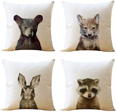 four pillows with different animals on them in the shape of square shapes, each featuring an animal's face