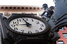 a large clock on the side of a building