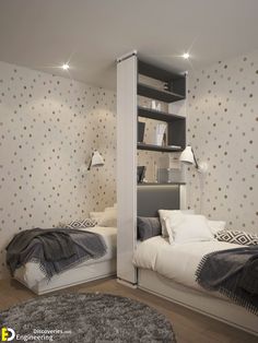 two beds in a room with white walls and flooring, one has a gray blanket on it